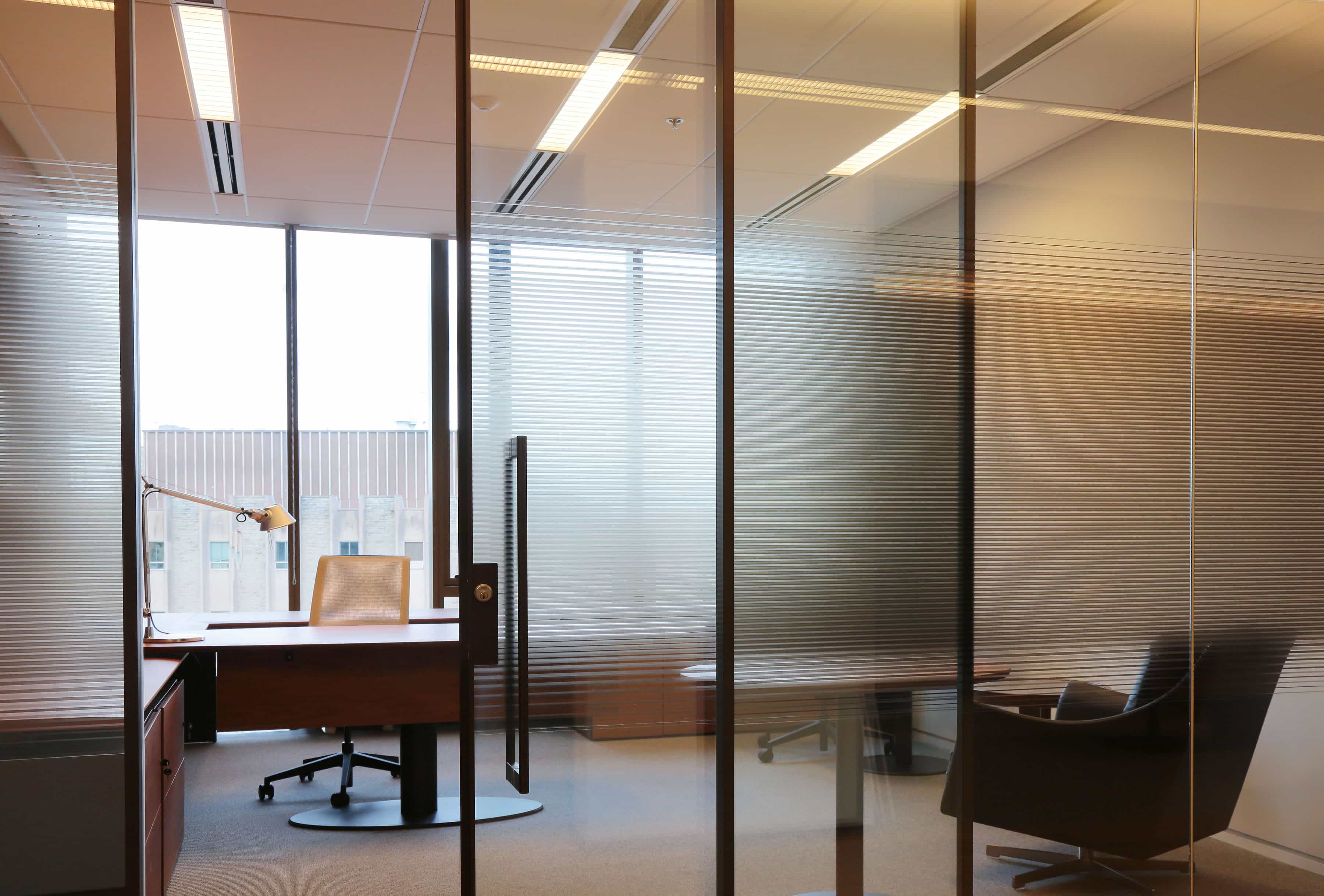 Clear glass materials create private space without sacrificing natural light.